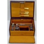 PART TRAVEL VANITY SET IN FITTED LEATHER CASE