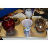 TRAY WITH POWDER FLASK, POOLE POTTERY VASE, ROYAL DOULTON BLUE AND WHITE VASE, WOODEN PLINTH, RED