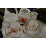 8PCE PORCELAIN TEA SERVICE ON TRAY,