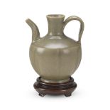 YAOZHOU-WARE CELADON GLAZED EWERSOUTHERN SONG DYNASTYwith globular lobed body supported on a