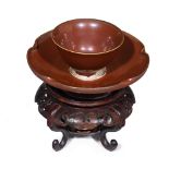 FINE DING-WARE BROWN-GLAZED TEACUP AND SAUCERSONG/YUAN DYNASTYboth covered in thick reddish brown