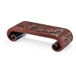 CINNABAR LACQUER SCROLL-FORM STANDQING DYNASTY, 18TH CENTURYthe rectangular body gently curving into