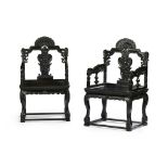 FINE PAIR OF ZITAN ARMCHAIRSLATE QING DYNASTYeach ornately carved in the Rococo style with