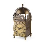 BRASS CASED LANTERN CLOCK 17TH CENTURY STYLE the semi spherical bell top above arched pierced sides,