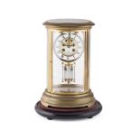 FRENCH BRASS OVAL FOUR GLASS MANTEL CLOCK 19TH CENTURY the circular white enamel Roman number dial