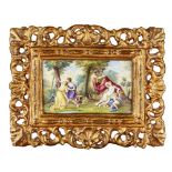 CONTINENTAL ENAMEL PLAQUE 19TH CENTURY depicting a mythological scene with a faun, Cupid and Psyche,