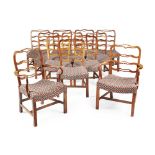 SET OF TWELVE GEORGE III STYLE ELM DINING CHAIRS 20TH CENTURY comprising ten side chairs and a