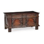 CHARLES I OAK CHEST EARLY 17TH CENTURY the hinged plank top with a moulded edge over a front panel