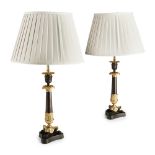 PAIR OF REGENCY STYLE PATINATED AND GILT BRONZE LAMPS converted from candlesticks, each with a