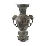 LARGE JAPANESE PATINATED BRONZE VASE with a flared neck above the baluster body with twin handles