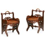 PAIR OF GOTHIC REVIVAL OAK HALL SEATS 19TH CENTURY the low open backs above plank seats and