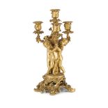 FRENCH GILT BRONZE FIGURAL CANDELABRA 19TH CENTURY the central nozzle and three outscrolling arms