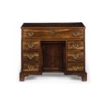 GEORGE III ROSEWOOD KNEEHOLE DESK 18TH CENTURY the rectangular top over a long frieze drawer and a