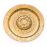 LARGE NUREMBURG BRASS ALMS DISH 17TH CENTURY with an engraved script border enclosing a raised