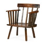 WELSH PRIMITIVE ASH AND ELM COMB BACK ARMCHAIR LATE 18TH / EARLY 19TH CENTURY the low back and