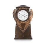 ARTS AND CRAFTS PATINATED COPPER MANTEL CLOCK, EARLY 20TH CENTURY the circular enamelled dial with