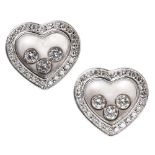 CHOPARD - A pair of 'Happy Diamonds' earringseach modelled as a heart, the central glazed panel with