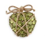 A peridot set heart brooch set throughout with oval cut peridots with ropetwist and bow detail,