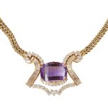 An amethyst and diamond necklaceclaw set with an oval mixed cut amethyst in a scrolling surround set