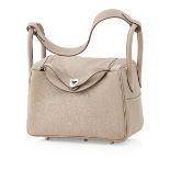 HERMES - A beige leather 'Lindy' bagthe leather exterior with silver and palladium hardware, with