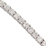 A diamond set line braceletclaw set with a row of forty one round brilliant cut diamonds, to a