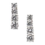 A pair of diamond set pendant earrings each claw set with a row of four graduated round brilliant