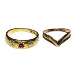 An 18 carat gold Edwardian ruby and diamond three stone ring and another