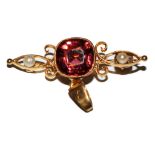 A gold and tourmaline pearl brooch