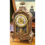 A 19th century Boullework and gilt metal mounted mantel clock with enamelled numerals, the