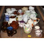 A collection of miniature jugs, including lustreware, Carltonware and Hammersley