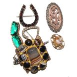 A small collection of antique jewellery brooches