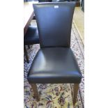 A set of eight leather upholstered dining chairs on square section legs