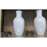 A pair of Chinese clair de lune glaze porcelain vases, moulded with ribbon bow motifs, marked on the
