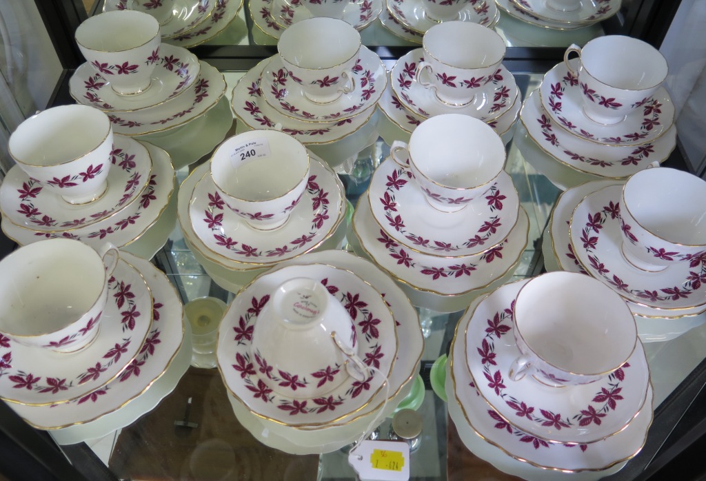 A Colclough china tea service, comprising cups, saucers and side plates for eleven place settings,