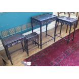 A nest of four Chinese hardwood tables, the rectangular tops over pierced vine leaf friezes and