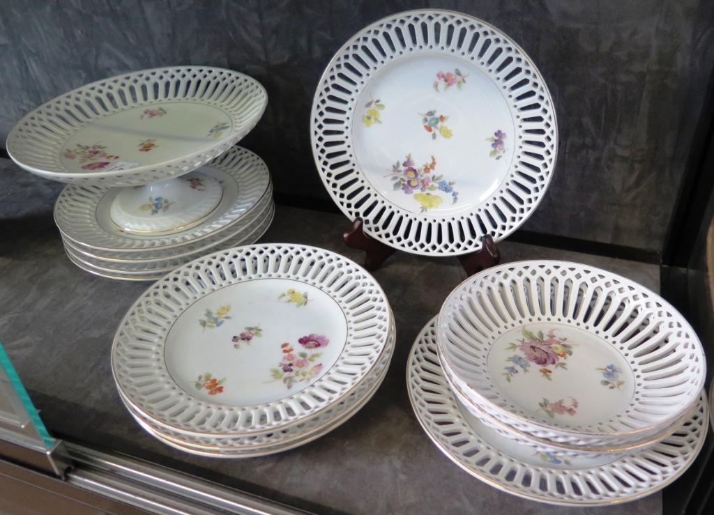 An early 20th century porcelain dessert service by Fraureuth, comprising nine plates, two bowls and