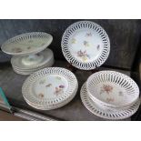 An early 20th century porcelain dessert service by Fraureuth, comprising nine plates, two bowls and