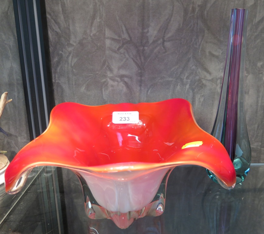 A large free blown white and red glass 'sculptured bowl, together with a teardrop shaped vase with a