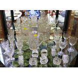 Glass decanters, glasses and napkin rings