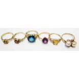 Six 9 carat gold gem set rings