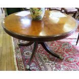 A mahogany circular snaptop breakfast table, the Victorian circular top over a later turned stem