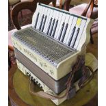 A Mazzini accordion, with two octave keyboard and twelve buttons, 32cm