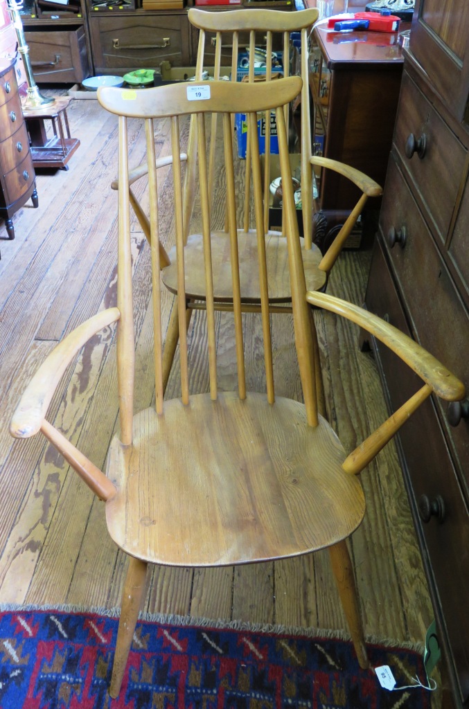 A pair of Ercol beech and elm Windsor armchairs stamped with BS 1960 kite mark C.F. 2056 (2)