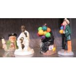 Royal Doulton 'The Balloon Boy', HN2934, 19.5cm high; 'The Balloon Man', HN1954, 18cm high; a Minton