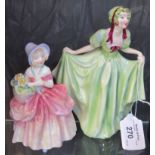 A Royal Doulton figure 'Cissie' HN 1809, 12.5cm high and another figure of a girl in a green