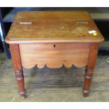 A 19th century mahogany box stool, the hinged rectangular top with moulded edge over a fret carved