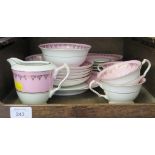A Czechoslovakian pink and gilt tea service, for six plate settlings, with tea cups, saucers,