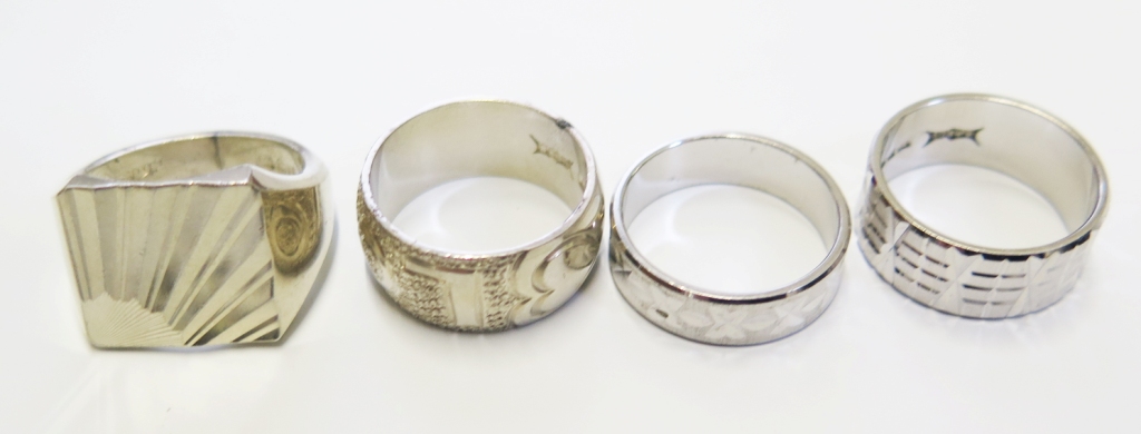 Four silver rings