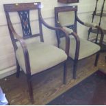 An Edwardian crossbanded and inlaid drawing room suite, comprising two seat settee and two graduated