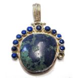 A silver and lapis lazuli stone set pendant
